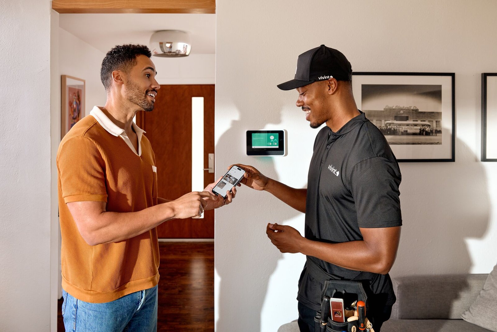 Vivint certified technician installing smart home system